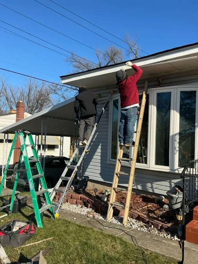 Restoration crew performing exterior repair in Lancaster